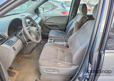 2010 Honda Odyssey Ex z USA, uszkodzony, nr VIN 5FNRL3H48AB027862